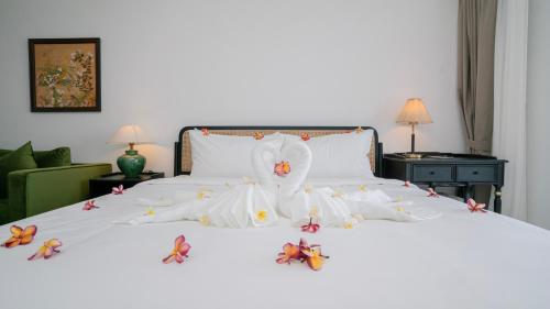 Ένα ή περισσότερα κρεβάτια σε δωμάτιο στο Merton Holiday Inn