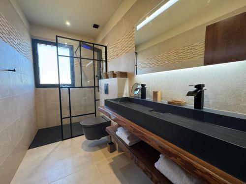 Ένα μπάνιο στο Residence I Pozzi