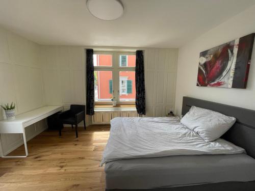 Postel nebo postele na pokoji v ubytování Modernes Appartement in Wald