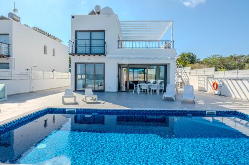 Πισίνα στο ή κοντά στο Esprit Seabreeze Villa 13