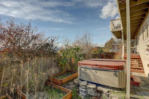 a garden with an old chest sitting next to a fence at Grandview Get-A-Way in White Salmon