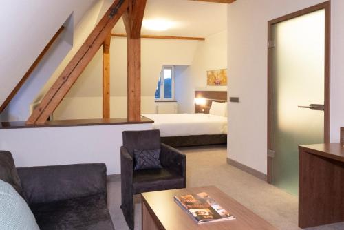 Ένα ή περισσότερα κρεβάτια σε δωμάτιο στο Hotel Brühlerhöhe