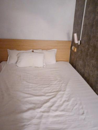 Postel nebo postele na pokoji v ubytování HOME 8b