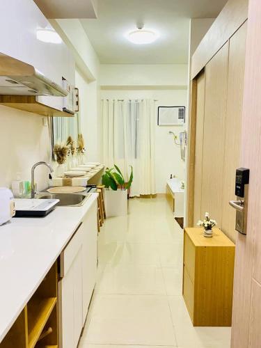 Kuchyň nebo kuchyňský kout v ubytování Staycation by Mailine
