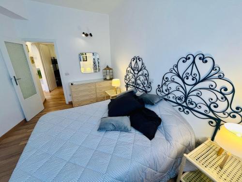 Postel nebo postele na pokoji v ubytování Oasi Elegante Aria Condizionata e Pet Friendly