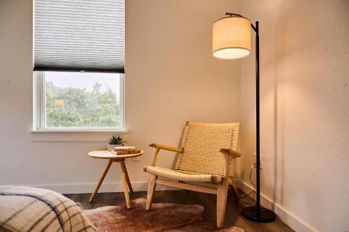 a room with a chair and a table and a window at A Stunning Escape in Canyon Lake