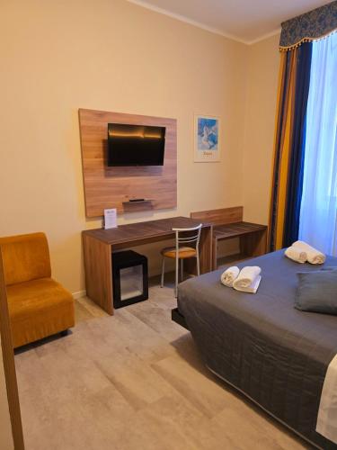 TV a/nebo společenská místnost v ubytování Hotel Romano