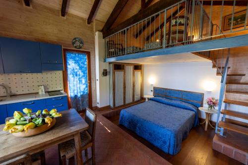 A bed or beds in a room at Agriturismo Natta Di Monte Tabor