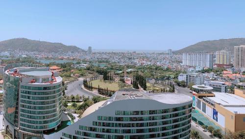 an overhead view of a city with a tall building at Cloud Nine The Song Vung Tau Homestay in Vung Tau