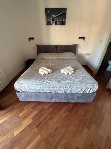 two towels on a bed in a bedroom at A&F House in Terni