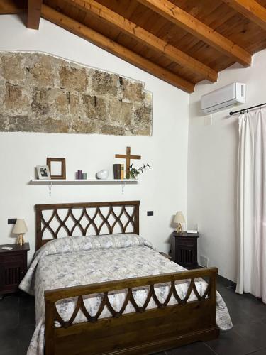 Ένα ή περισσότερα κρεβάτια σε δωμάτιο στο U Pantanu