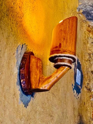 a drawing of a urinal on a wall at The Cave in Yatiyantota