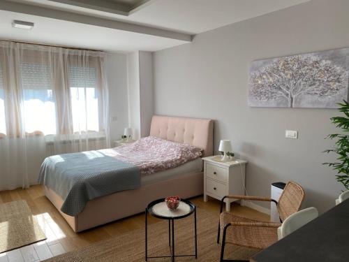 Postel nebo postele na pokoji v ubytování Manhattan studio A blok