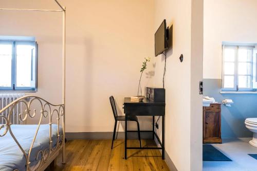 Postel nebo postele na pokoji v ubytování Le 3 Rane B&B