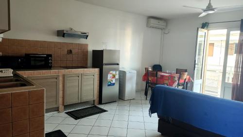 Køkken eller tekøkken på Le Frangipagnier Appartement T2 Centre ville