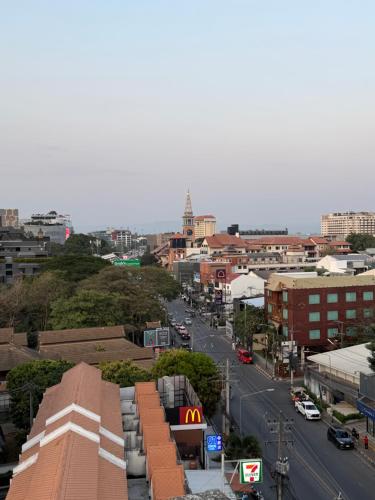 a view of a city with a street and buildings at The Empire Nimman in Chiang Mai