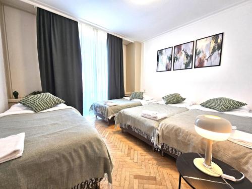 Postel nebo postele na pokoji v ubytování Representative City Villa