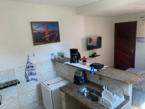 Køkken eller tekøkken på Caminho do mirante, suíte 5