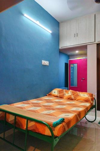 Ένα ή περισσότερα κρεβάτια σε δωμάτιο στο Y's Independent 2BHK Home