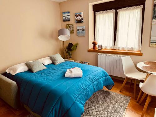 Ένα ή περισσότερα κρεβάτια σε δωμάτιο στο Apartamento con encanto en plena naturaleza