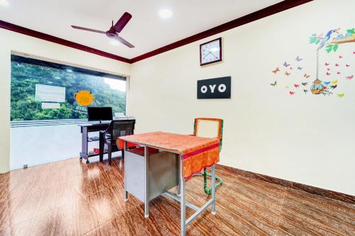 Fotografie z fotogalerie ubytování Hotel O UDHAYA LODGE v destinaci Kuttalam