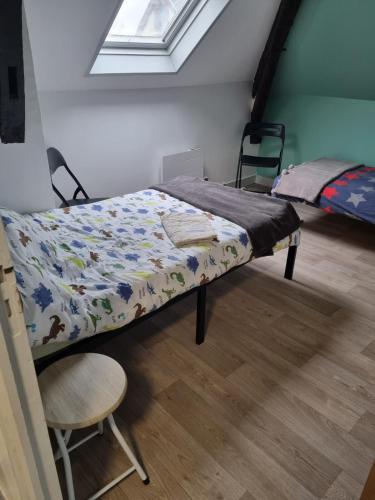 Postel nebo postele na pokoji v ubytování LPE Maison Gite proche Illiers Combray
