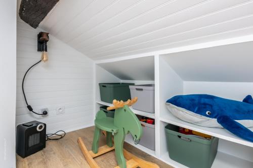 a childs room with a shark bed and a desk at Le 27 - Appartement Cosy - Disney 15min in Crecy la Chapelle