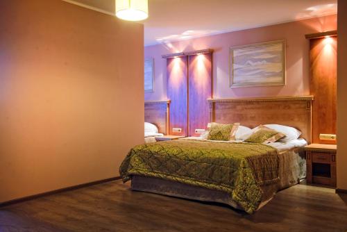 Una cama o camas en una habitación de Hotel Pietrak