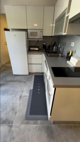 Η κουζίνα ή μικρή κουζίνα στο Mandy Apartman