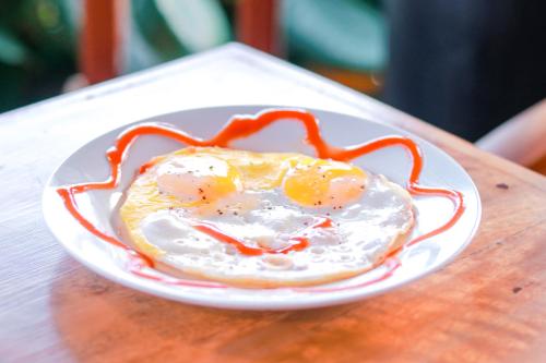 a plate with an egg in the shape of a spider at A2 HavenX in Hikkaduwa