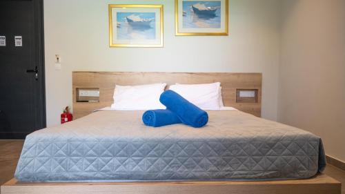 Ένα ή περισσότερα κρεβάτια σε δωμάτιο στο DeLight Luxury Rooms