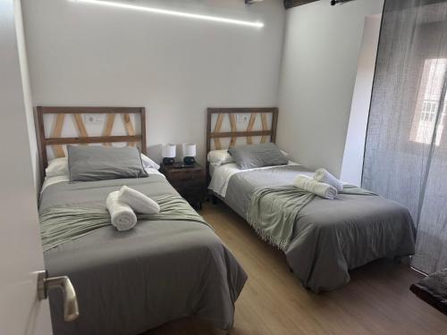 Katil atau katil-katil dalam bilik di Casa Lounge Xacobeo