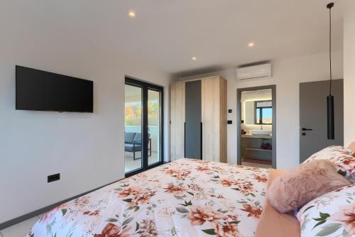 Ένα ή περισσότερα κρεβάτια σε δωμάτιο στο Villa Duplich