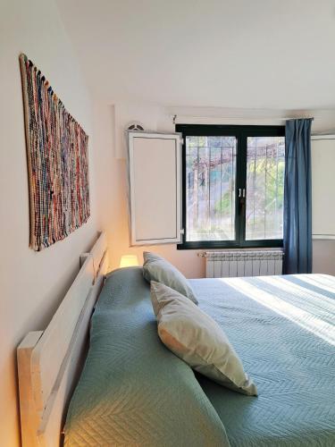 Giường trong phòng chung tại Casa Mar'Cellina - Tenuta Calano