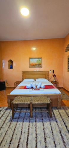 a bedroom with a large bed in a room at Ryad 91 in Casablanca