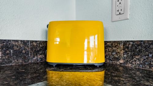 a yellow object sitting on top of a counter at MoonStone 3BR Beachfront w Hot Tub Amazing Beach Views and Large Deck in Gilchrist