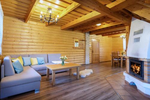 Posezení v ubytování Drevenica pri Mare - Tatralake Log Cabin near Auqapark Tatralandia and lake Liptovska Mara
