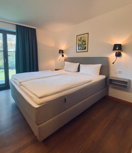 Postel nebo postele na pokoji v ubytování Gasthaus - Hotel Alt Fürstätt