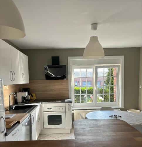 Dapur atau dapur kecil di Gîte de charme à la Ferme de Bonavis 125 M2