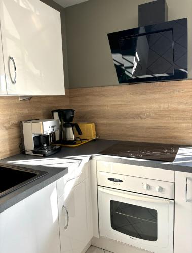 Dapur atau dapur kecil di Gîte de charme à la Ferme de Bonavis 125 M2