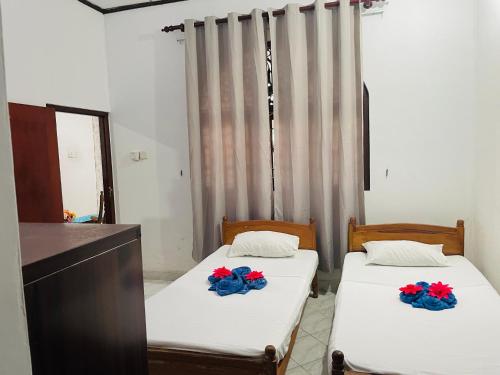 Katil atau katil-katil dalam bilik di Villa ranjika