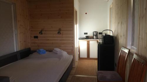 Postel nebo postele na pokoji v ubytování Vana Postimaja Accommodation
