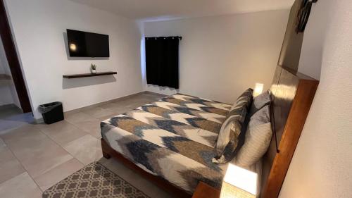 Postel nebo postele na pokoji v ubytování Pedernal Hotel