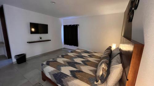 Postel nebo postele na pokoji v ubytování Pedernal Hotel