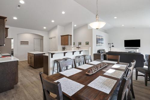 a dining room and kitchen with a table and chairs at Four Seasons Retreat in Bend