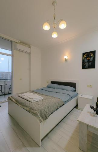 Postel nebo postele na pokoji v ubytování Luxury apartment in Batumi