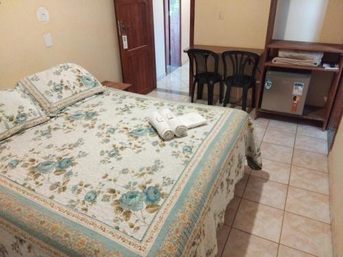 Una cama o camas en una habitación de Aconchego Canastra Hotel
