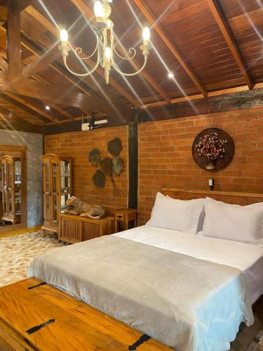 เตียงในห้องที่ Recanto Libbralon