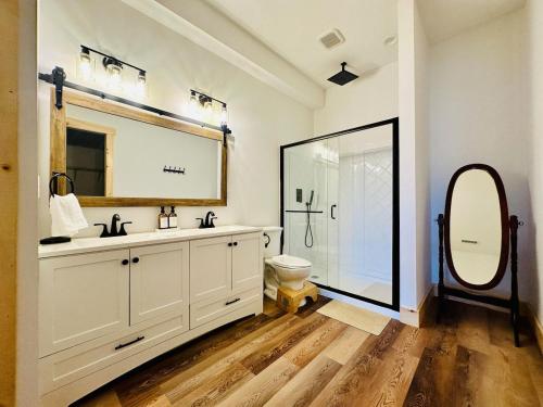 a bathroom with a sink and a mirror at Moksha Retreat in Black Mountain
