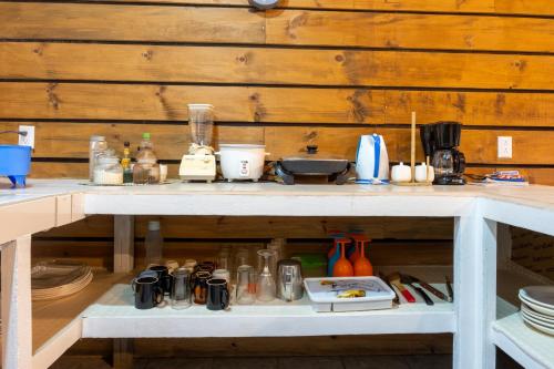 a table with a bunch of items on it at Tierra Buena Countryside Hotel in Monteverde Costa Rica